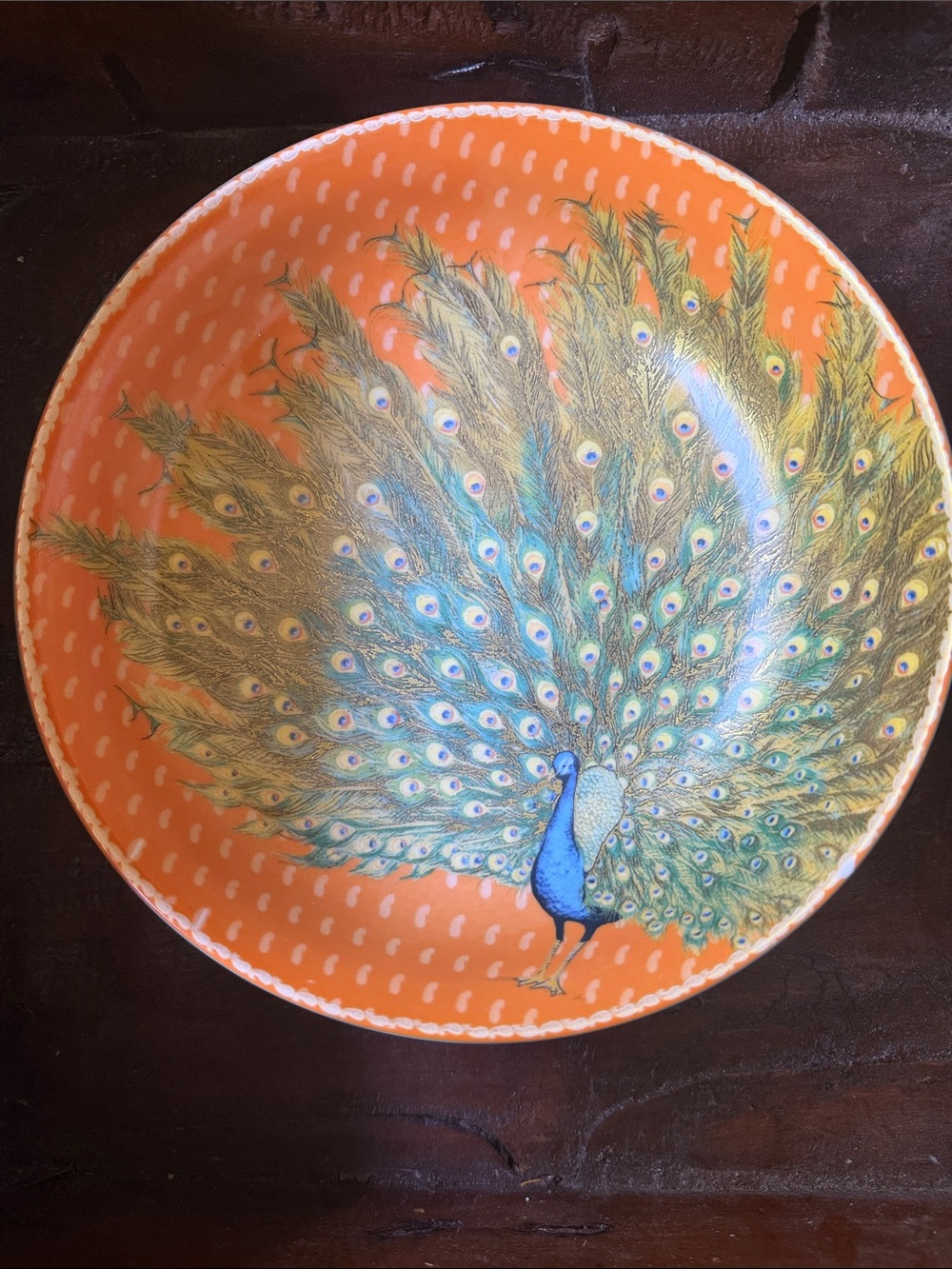 Discontinued William Sonoma Peacock Orange Ceramic Bowl from the Raj collection
